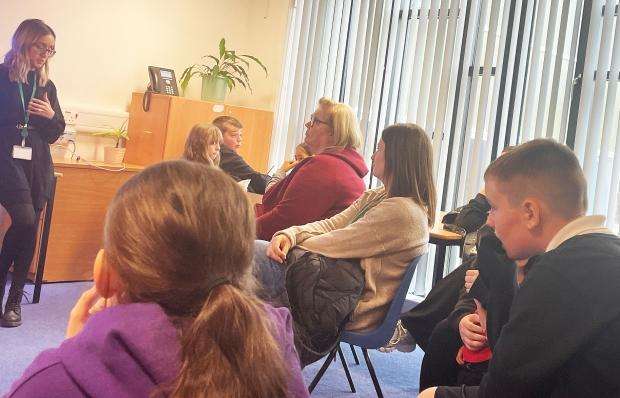 Parents and carers at the school drop-in session