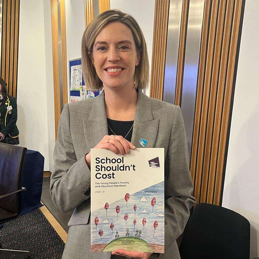 Cabinet Secretary for Education Jenny Gilruth holds a copy of the School Shouldn't Cost manifesto