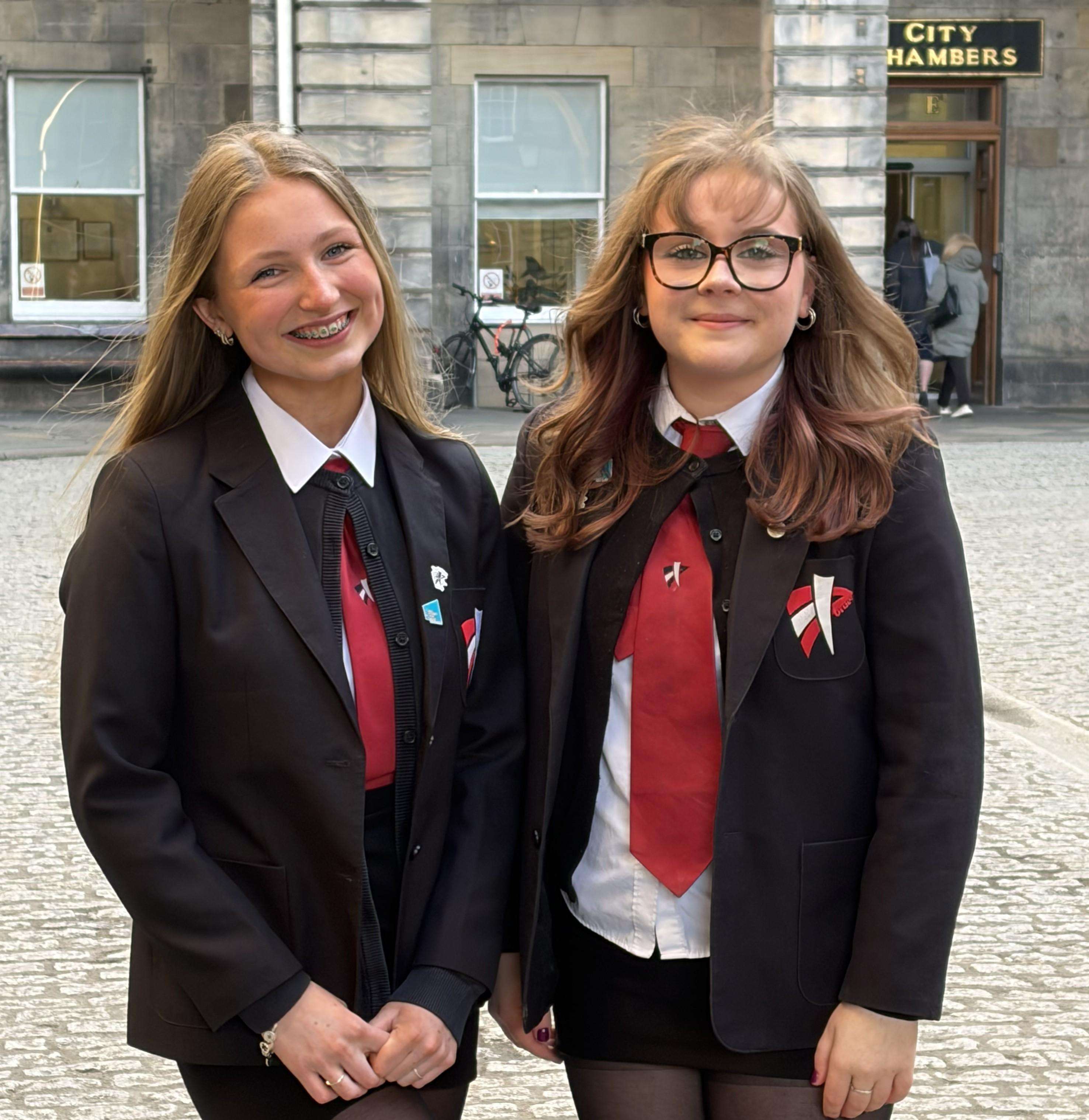 Two pupils from Braes High School at the 1 in 5 event in Edinburgh